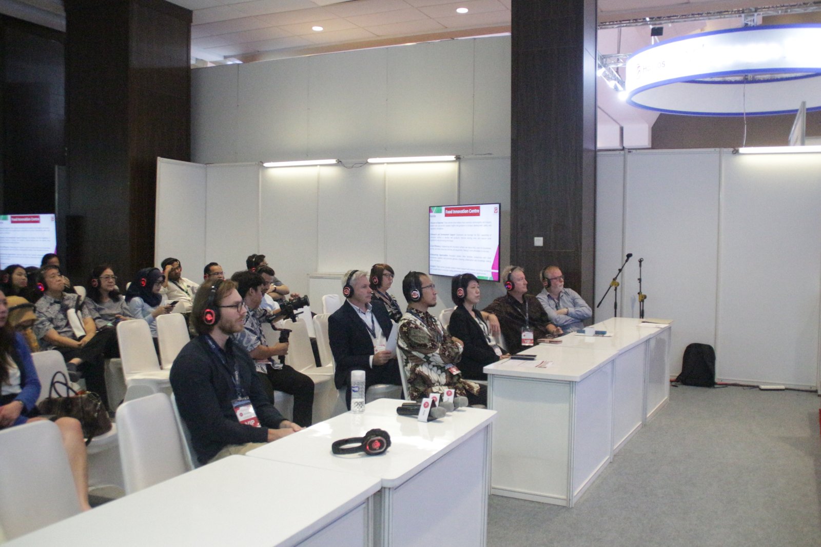 Participants seated in the conference room during a parallel session